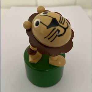 Vintage DETOA Lion Wood Figurine Push-up toy wooden press up movable jointed